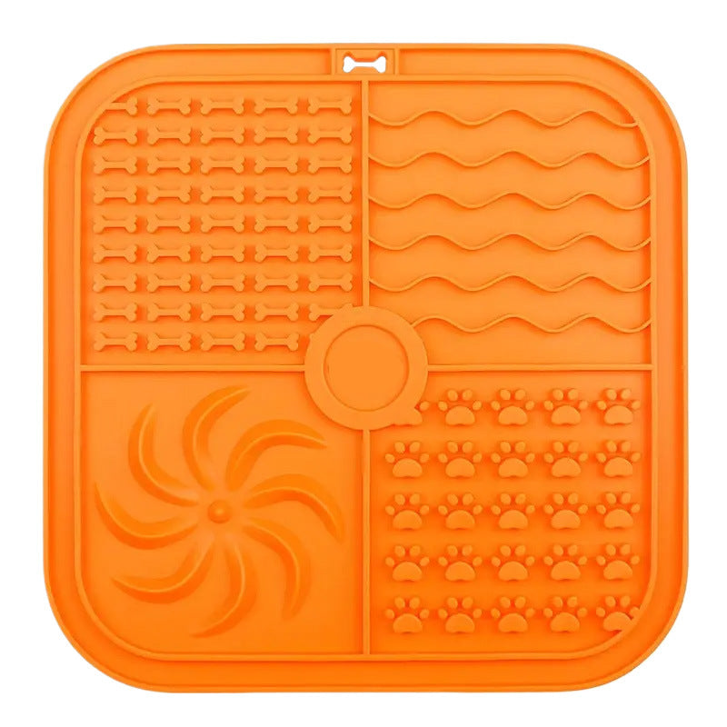 Alfombrilla de lamer de silicona naranja con ventosa