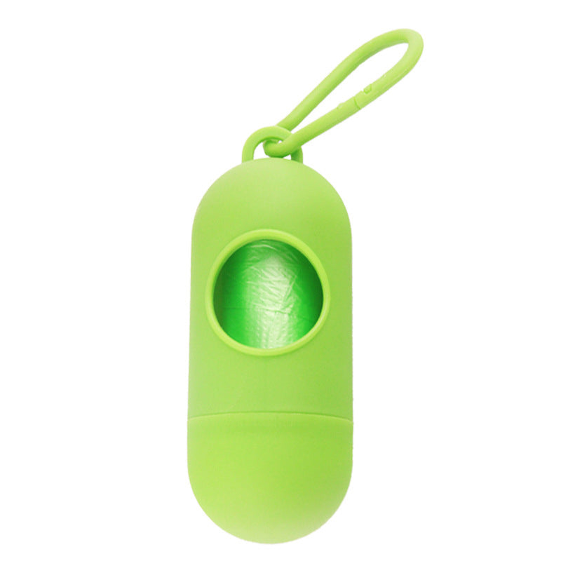 Dispensador de bolsas para cacas de perro color verde con anilla