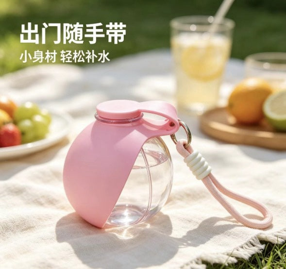 Botella de agua portatil para mascotas, escena de picnic al aire libre